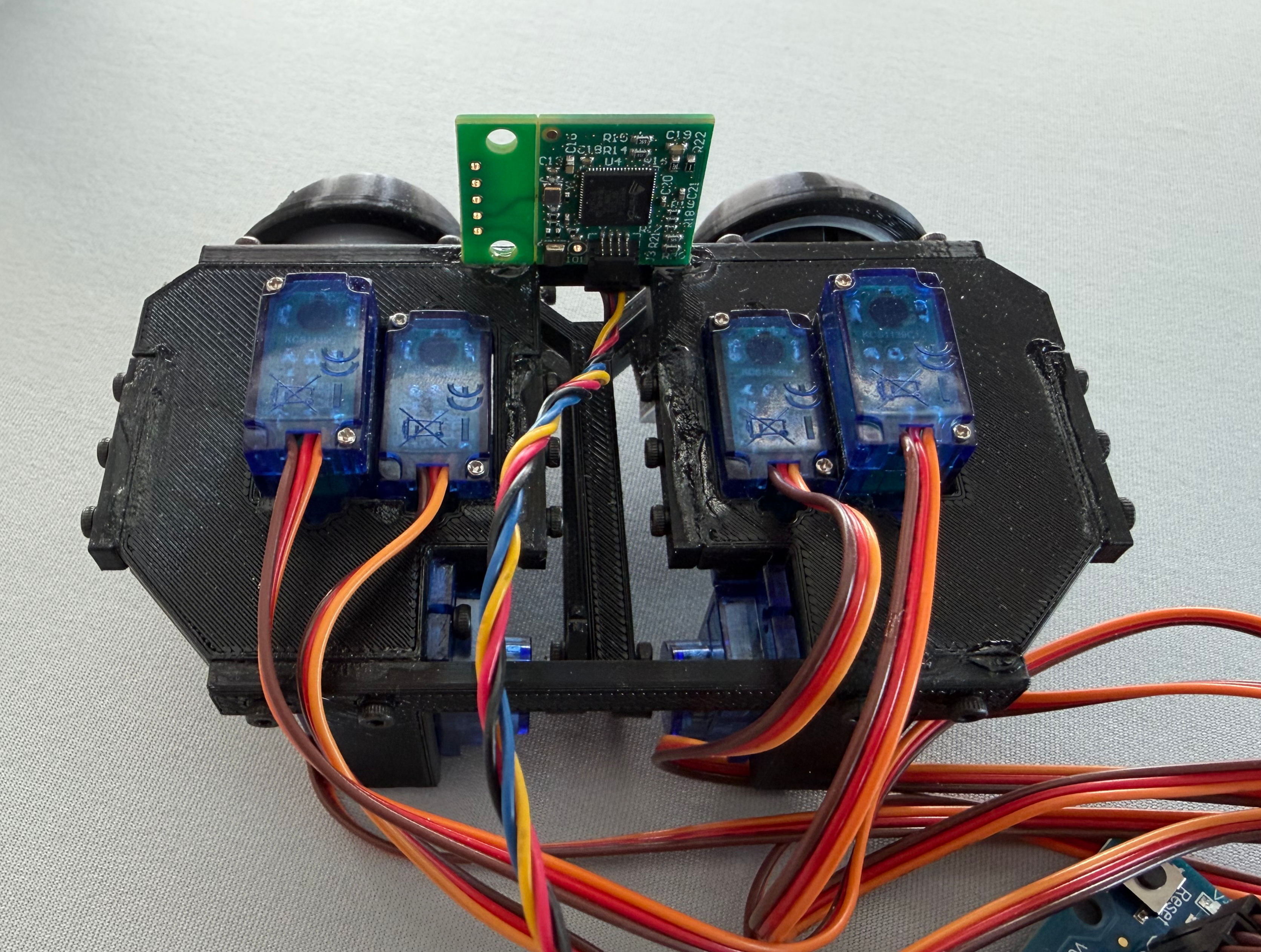 Servo and controller wiring behind the eyes